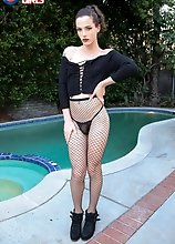 Carrie Emberlyn is indeed stunning! Watch her posing and stroking her cock until she cums in this smashing solo scene!